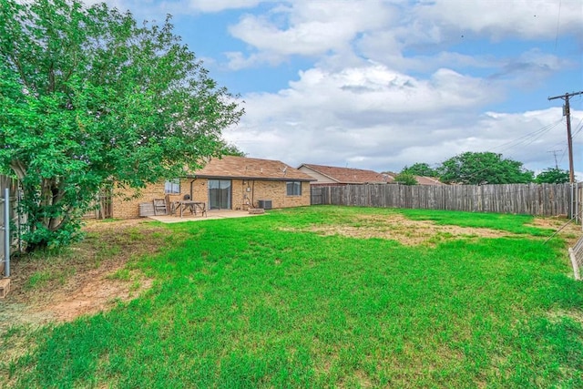 1904 Gemini St, Altus, OK 73521 - view of yard with a patio and central AC unit