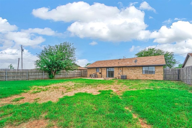 1904 Gemini St, Altus, OK 73521 - rear view of property with cooling unit, a patio area, and brick siding