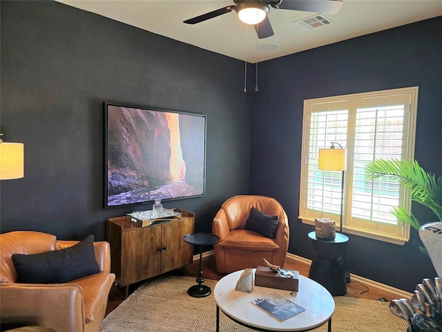 5608 NW 127th St, Oklahoma City, OK 73142 - living area with a ceiling fan and baseboards