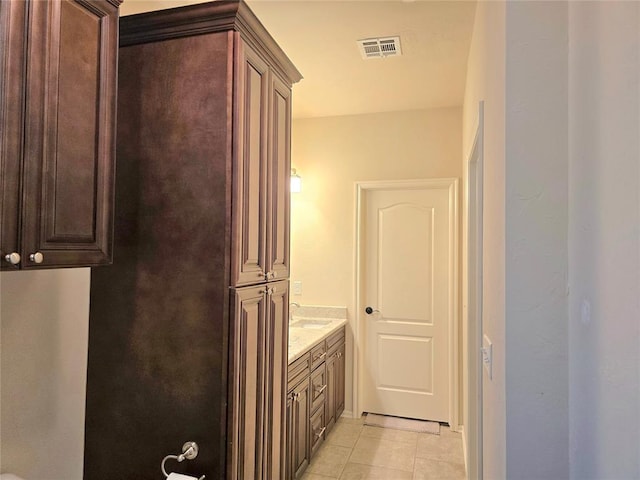5608 NW 127th St, Oklahoma City, OK 73142 - bathroom with tile patterned flooring and vanity