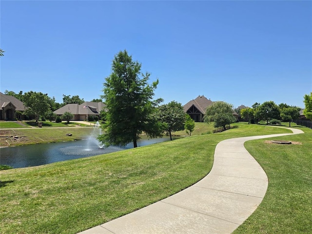 5608 NW 127th St, Oklahoma City, OK 73142 - surrounding community featuring a water view and a yard