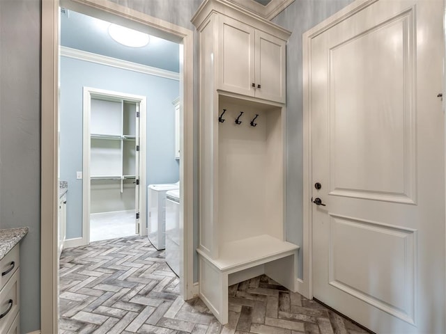 832 Gateway Bridge Rd, Edmond, OK 73034 - mudroom with crown molding and washing machine and dryer