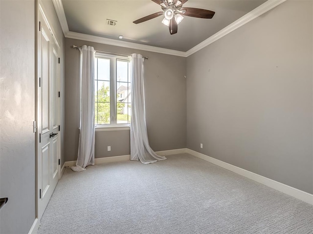 832 Gateway Bridge Rd, Edmond, OK 73034 - unfurnished room with crown molding, light carpet, a ceiling fan, and baseboards