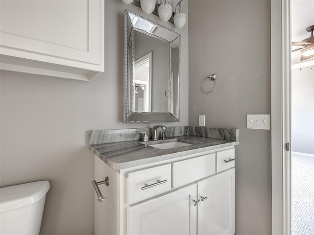 832 Gateway Bridge Rd, Edmond, OK 73034 - bathroom featuring vanity and toilet