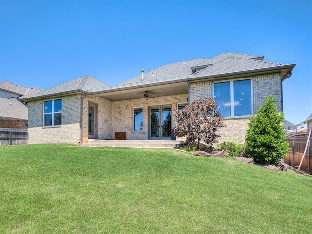 832 Gateway Bridge Rd, Edmond, OK 73034 - rear view of property featuring french doors, brick siding, a ceiling fan, and a shingled roof