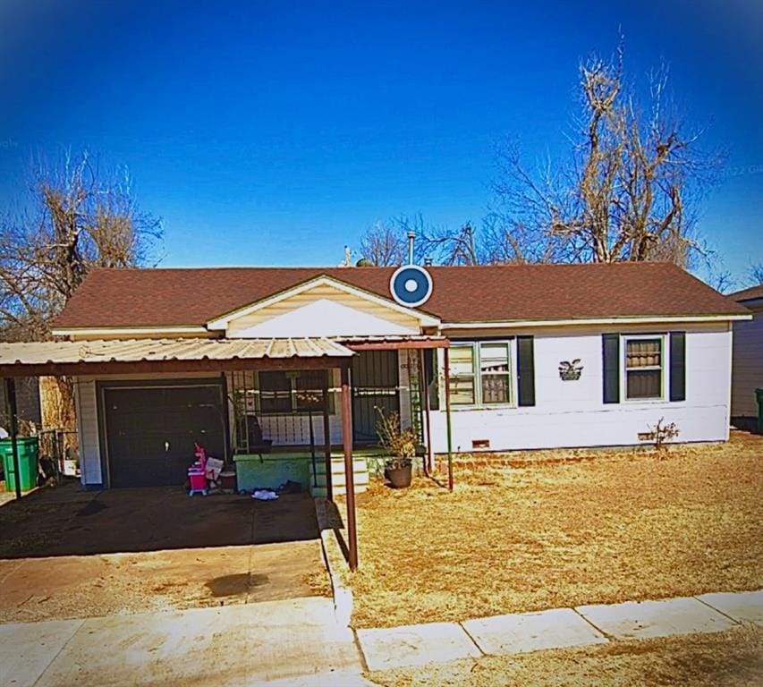 2921 SW 48th St, Oklahoma City, OK 73119 - ranch-style home featuring an attached garage, asphalt driveway, and a shingled roof