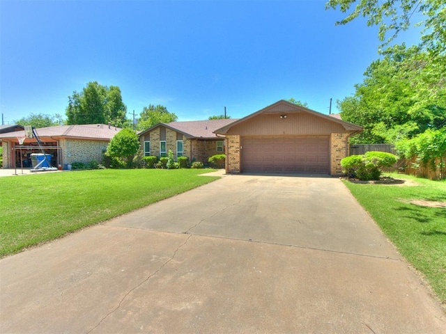 view of front of home featuring brick siding, driveway, and a garage