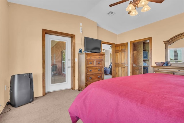 28256 N County Road 3210th Rd, Wynnewood, OK 73098 - carpeted bedroom featuring lofted ceiling, access to exterior, and ceiling fan