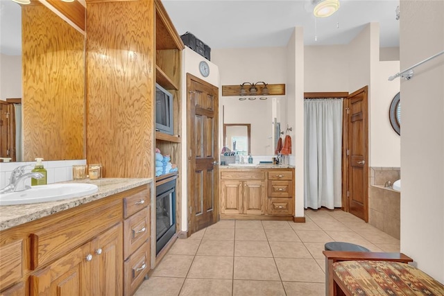 28256 N County Road 3210th Rd, Wynnewood, OK 73098 - bathroom with tile patterned flooring and two vanities