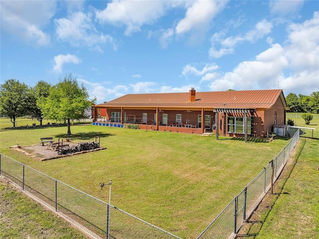 28256 N County Road 3210th Rd, Wynnewood, OK 73098 - rear view of house featuring a chimney, metal roof, and brick siding