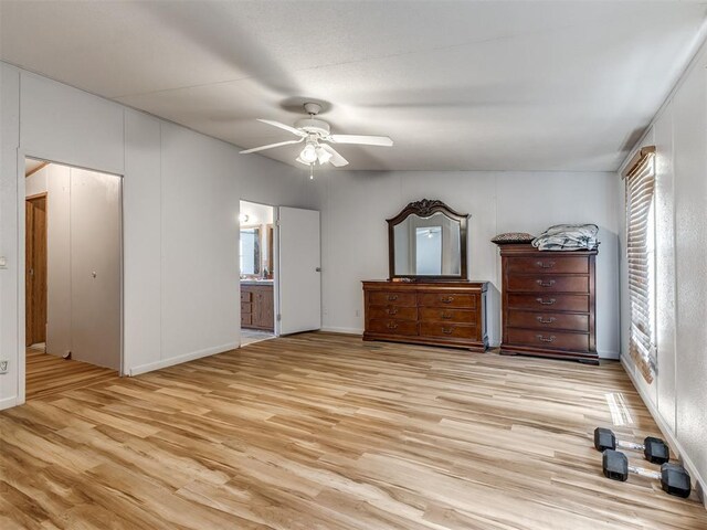 11550 Timber Trl, Lexington, OK 73051 - unfurnished bedroom featuring light wood-style floors, ensuite bathroom, a ceiling fan, and baseboards