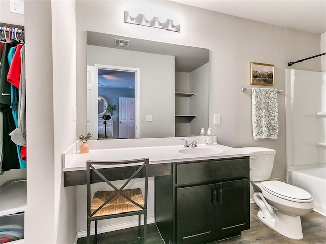 11704 NW 99th Ter, Yukon, OK 73099 - full bathroom with vanity, toilet, and washtub / shower combination