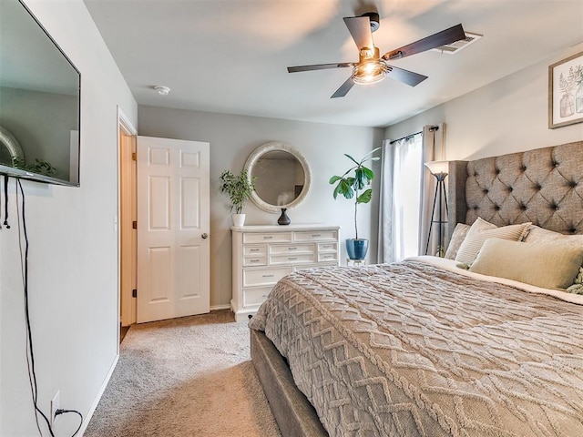 11704 NW 99th Ter, Yukon, OK 73099 - bedroom featuring carpet, baseboards, and ceiling fan