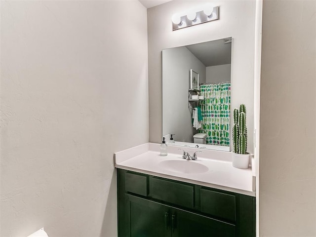 11704 NW 99th Ter, Yukon, OK 73099 - bathroom featuring toilet and vanity
