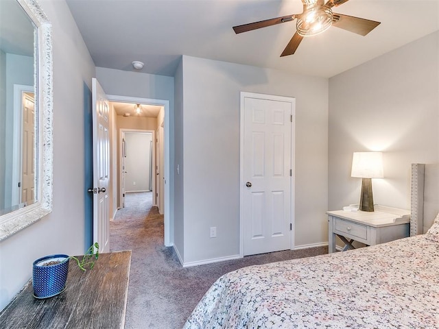11704 NW 99th Ter, Yukon, OK 73099 - carpeted bedroom featuring baseboards and ceiling fan