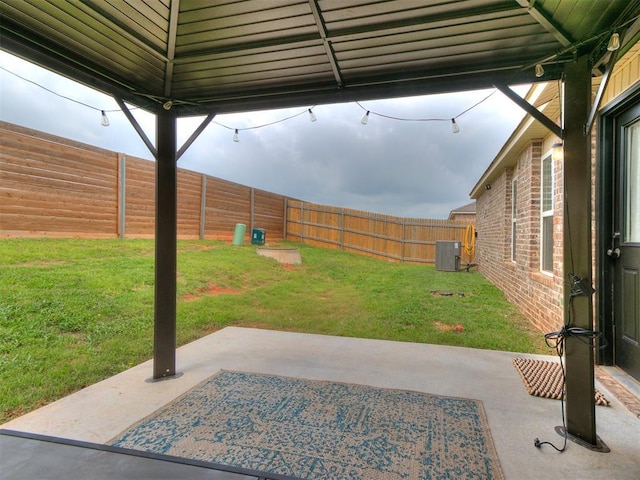 11704 NW 99th Ter, Yukon, OK 73099 - view of yard featuring cooling unit and a patio