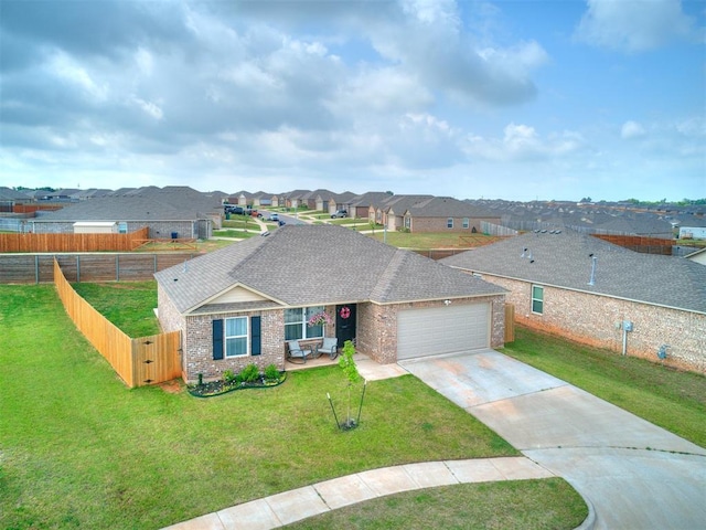 11704 NW 99th Ter, Yukon, OK 73099 - view of front facade with brick siding, a garage, a residential view, concrete driveway, and a shingled roof