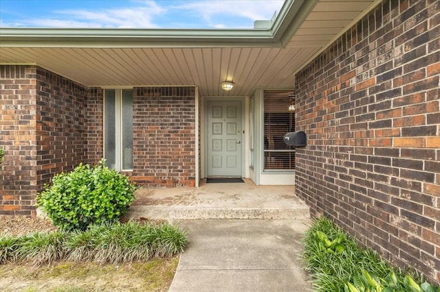 708 Cross Timbers Dr, Moore, OK 73160 - doorway to property featuring brick siding