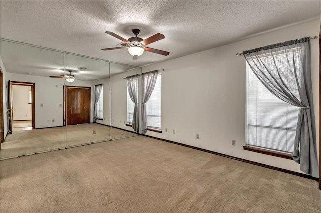 708 Cross Timbers Dr, Moore, OK 73160 - unfurnished room featuring light carpet, ceiling fan, a textured ceiling, and baseboards