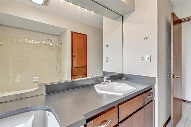 708 Cross Timbers Dr, Moore, OK 73160 - full bath featuring vanity, tile patterned floors, toilet, a textured ceiling, and a shower