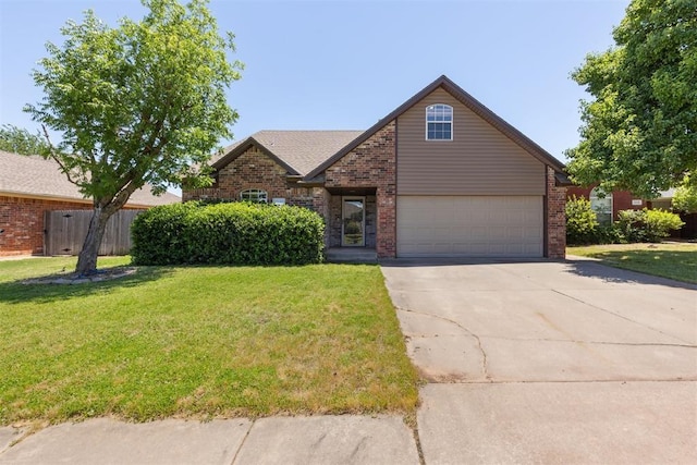 316 SE 6th St, Moore, OK 73160 - traditional-style home featuring brick siding, driveway, and an attached garage