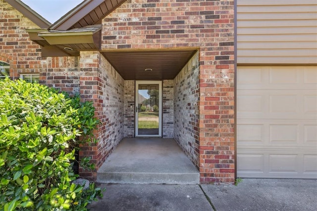 316 SE 6th St, Moore, OK 73160 - property entrance with brick siding and a garage