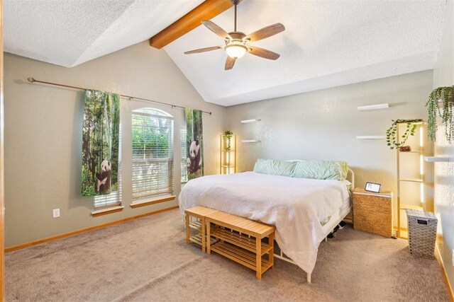 316 SE 6th St, Moore, OK 73160 - carpeted bedroom featuring a textured ceiling, a ceiling fan, and baseboards