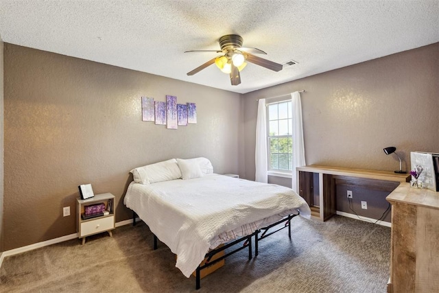 316 SE 6th St, Moore, OK 73160 - bedroom featuring carpet flooring, a textured ceiling, a textured wall, baseboards, and ceiling fan