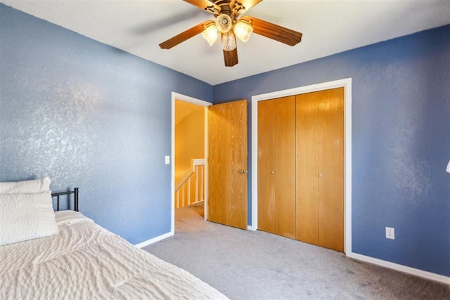 316 SE 6th St, Moore, OK 73160 - carpeted bedroom with baseboards, a ceiling fan, and a closet