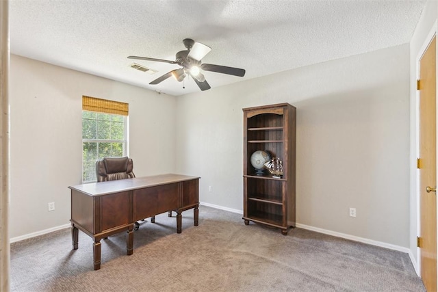 316 SE 6th St, Moore, OK 73160 - office area featuring a ceiling fan, carpet floors, a textured ceiling, and baseboards