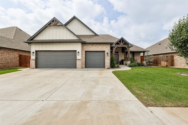 12004 SW 49th St, Mustang, OK 73064 - view of front of home featuring an attached garage, board and batten siding, driveway, brick siding, and a shingled roof