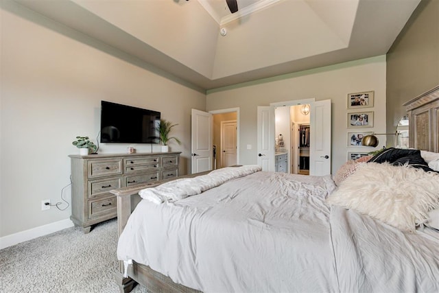 12004 SW 49th St, Mustang, OK 73064 - bedroom with light colored carpet, a towering ceiling, baseboards, ensuite bathroom, and a ceiling fan