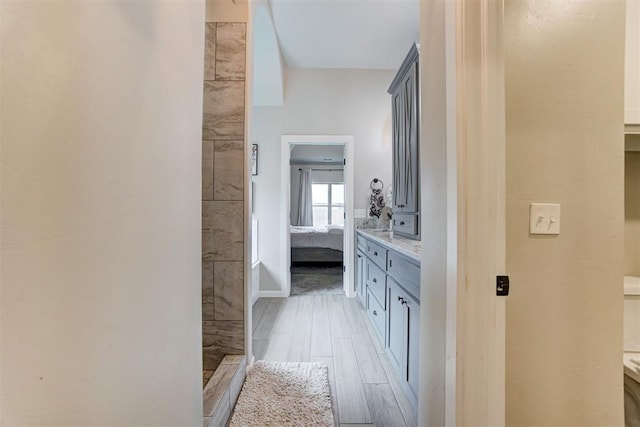 12004 SW 49th St, Mustang, OK 73064 - ensuite bathroom with wood finished floors and vanity