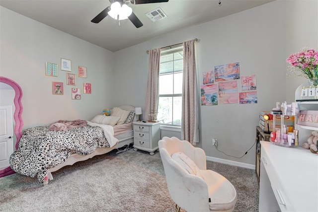 12004 SW 49th St, Mustang, OK 73064 - carpeted bedroom featuring ceiling fan and baseboards
