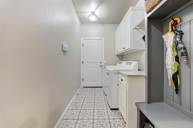 12004 SW 49th St, Mustang, OK 73064 - washroom with washer and clothes dryer, baseboards, and cabinet space