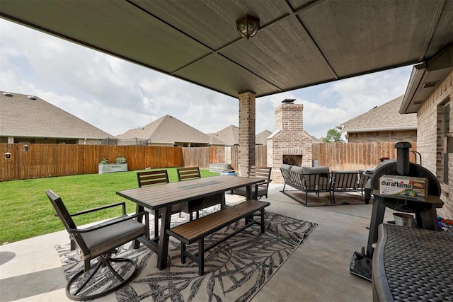 12004 SW 49th St, Mustang, OK 73064 - view of patio featuring an outdoor brick fireplace and outdoor dining area