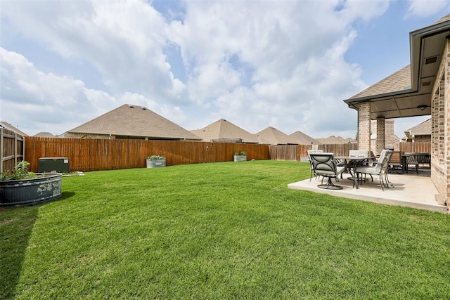 12004 SW 49th St, Mustang, OK 73064 - view of yard with a patio area