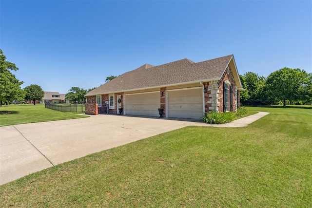 16523 Roserock Cir, Choctaw, OK 73020 - view of side of home with concrete driveway, an attached garage, brick siding, and a shingled roof