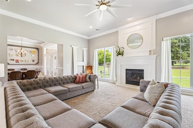 16523 Roserock Cir, Choctaw, OK 73020 - living area with carpet floors, a chandelier, healthy amount of natural light, ornamental molding, and a fireplace