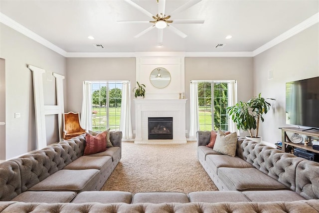 16523 Roserock Cir, Choctaw, OK 73020 - living room with a ceiling fan, carpet, crown molding, a brick fireplace, and recessed lighting