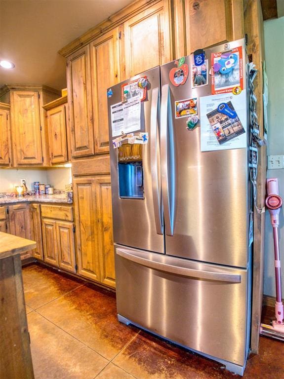 34325 E 1070th Rd, Mcloud, OK 74851 - kitchen featuring stainless steel fridge with ice dispenser, dark tile patterned floors, and recessed lighting
