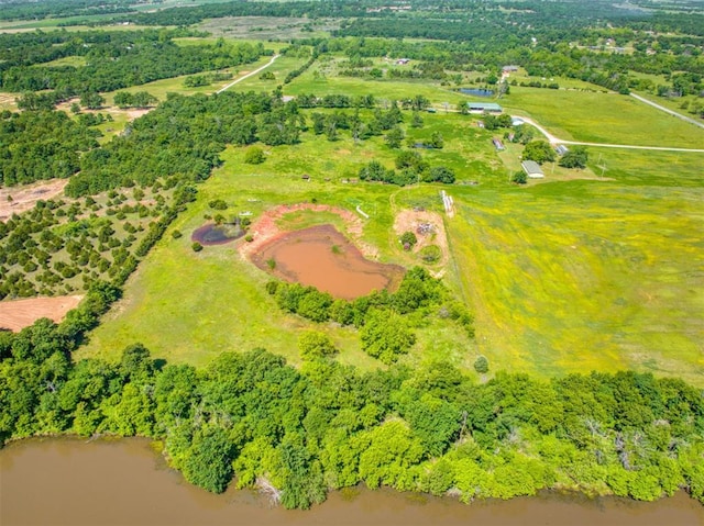 34325 E 1070th Rd, Mcloud, OK 74851 - aerial view of sparsely populated area with a nearby body of water
