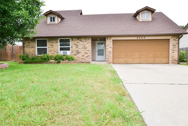 8409 Bigwood Dr, Oklahoma City, OK 73135 - cape cod home with brick siding, an attached garage, driveway, and a shingled roof