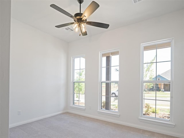 7909 NW 162nd St, Edmond, OK 73013 - spare room with carpet, baseboards, and ceiling fan