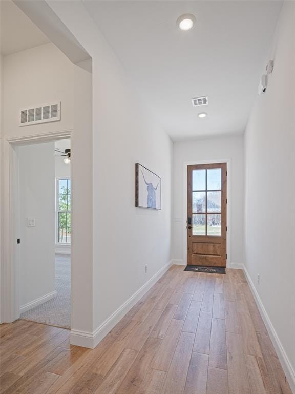 7909 NW 162nd St, Edmond, OK 73013 - entrance foyer featuring healthy amount of natural light, light wood-style flooring, baseboards, and recessed lighting