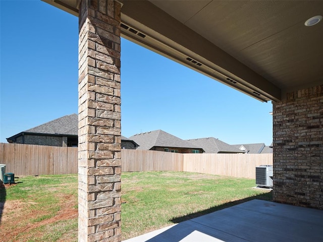 7909 NW 162nd St, Edmond, OK 73013 - view of yard featuring central AC unit and a patio