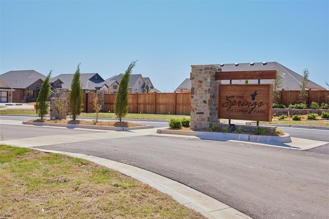 7909 NW 162nd St, Edmond, OK 73013 - view of asphalt road featuring a residential view and curbs