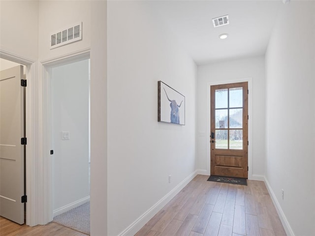 7909 NW 162nd St, Edmond, OK 73013 - entryway featuring light wood-type flooring and baseboards