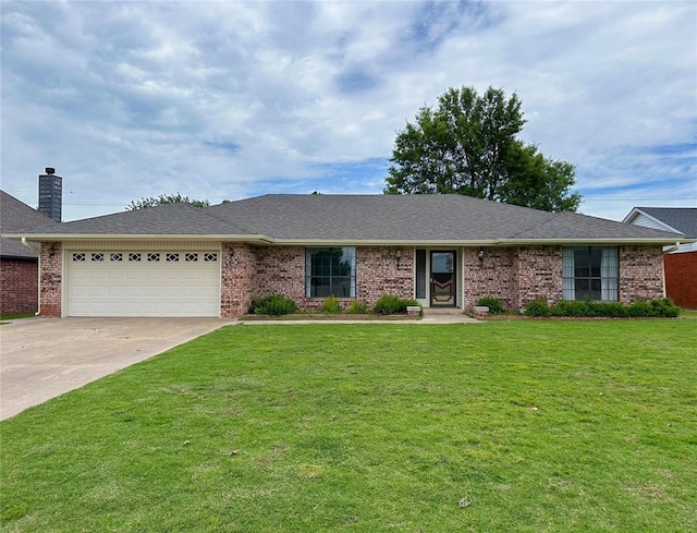 715 N Max, Hinton, OK 73047 - ranch-style home with a garage, driveway, a front lawn, and brick siding