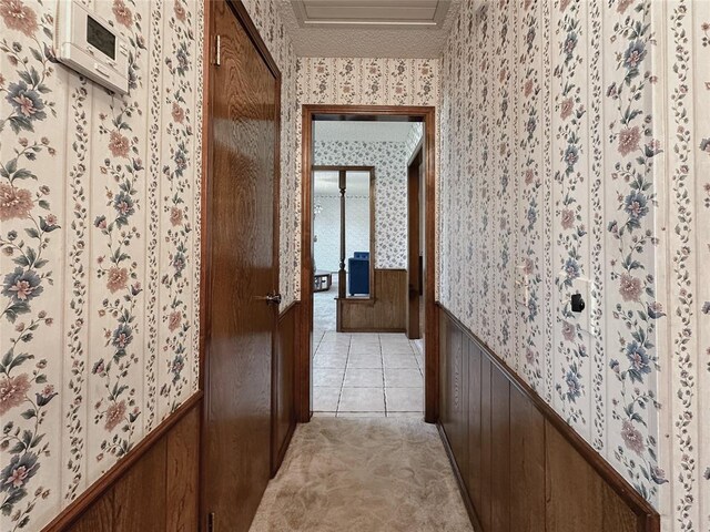 715 N Max, Hinton, OK 73047 - hall featuring wallpapered walls and wainscoting